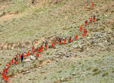 Rescuers search for victims in Jingtai County of Baiyin City, northwest China's Gansu Province.