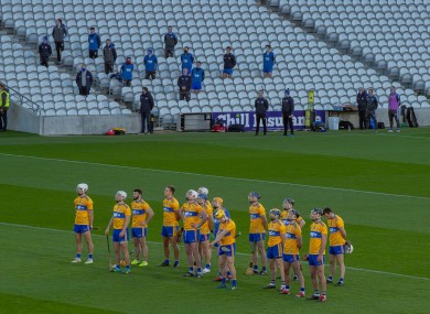 Clare players and substitutes in the stand.