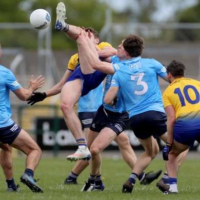 Dublin's James McCarthy, Tom Lahiff and David Byrne with Eddie Nolan of Roscommon.