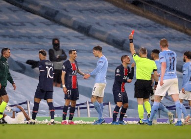 Paris Saint-Germain's Angel Di Maria (no.11) is shown a red card.