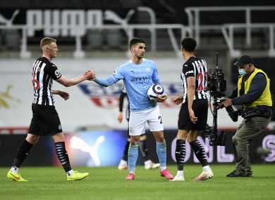 Manchester City's Ferran Torres with the match ball at the end of the clash.