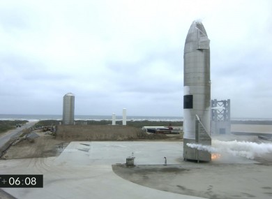 The Starship test vehicle sits on the ground after returning from a flight test in Boca Chica, Texas