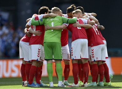 The Denmark team in a huddle prior to yesterday's Euro 2020 fixture against Finland in Copenhagen.