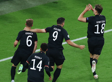 Leon Goretzka celebrates scoring.