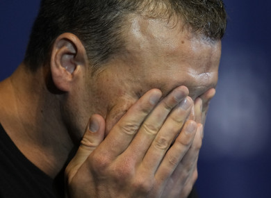 Ryan Lochte cries during an interview after the men's 200 individual medley.