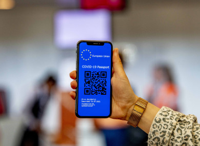 A Covid passport with a QR code on a mobile phone at Rotterdam the Hague airport, Netherlands.
