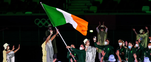 Kellie Harrington and Brendan Irvine carry the flag for Team Ireland.