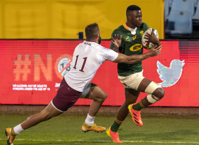 Debutant Aphele Fassi on his way to scoring a try.