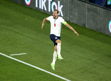 Harry Kane celebrates his second and England's third goal.