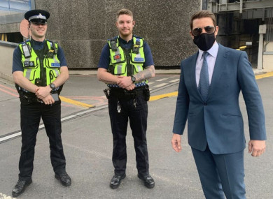 Tom Cruise posing for a photo with BTP officers at Birmingham New Street station