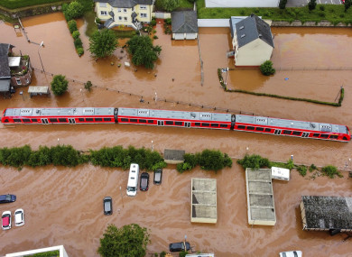 A regional train in the flood waters at the local station in Kordel, Germany.