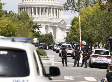US Capitol Police create a security perimeter as they investigate a truck bomb near the building in Washington DC.