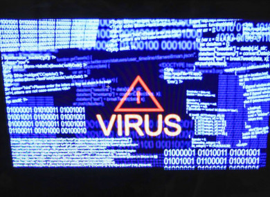 File photo of a virus on a computer