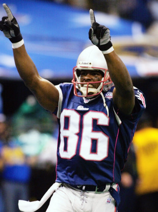 New England Patriots receiver David Patten (86) celebrates after catching a touchdown pass from quarterback Tom Brady (file pic).