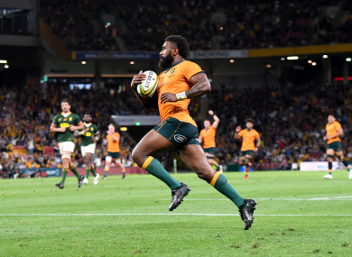 Marika Koroibete of the Wallabies on his way to score a try.