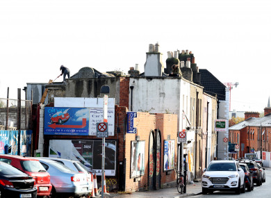 Activists on the roof of the occupied building on Prussia Street yesterday.