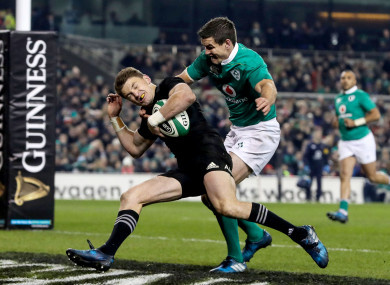 Sexton attempts to prevent Barrett from scoring in 2016.