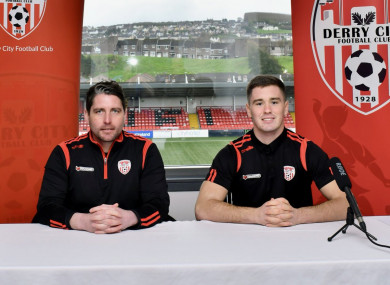 Derry City manager Ruaidhri Higgins alongside Brian Maher.