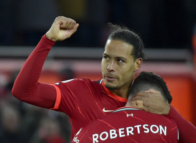 Virgil van Dijk celebrates his side's fourth goal.