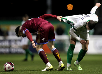 Conor O'Keeffe battles with Ryan Graydon.