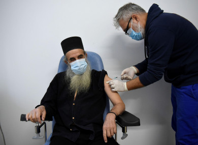 A member of an Orthodox monastic community in Greece receiving a Covid-19 vaccine this month.