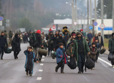 Migrants near the Bruzgi transport and logistics centre on the Belarusian-Polish border