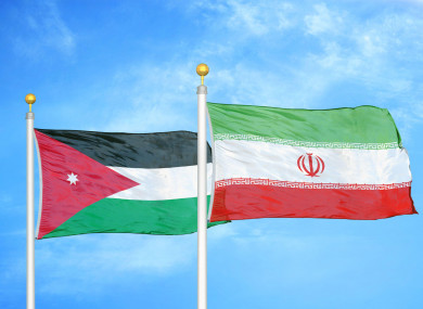 The flags of Jordan and Iran.