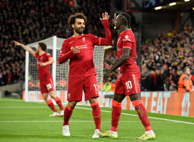 Sadio Mane celebrates his goal with Mo Salah.