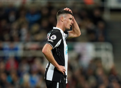 Ciaran Clark reacts to his red card.