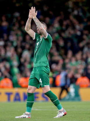 Shane Duffy applauds fans after the game.