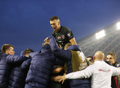 Croatia's players celebrate a goal in a 2022 FIFA World Cup Group H Qualifying Round football match against Russia at Poljud Stadium.
