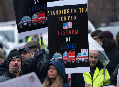 Demonstrators protest against coronavirus vaccine mandates in Boston. 5 January.