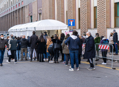 People queuing to get vaccinated outside the covid-19 vaccination centre in Rome, Italy