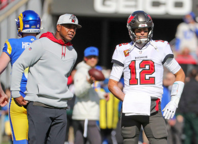 Tampa Bay Buccaneers offensive coordinator Byron Leftwich, left, is seen on the field with Buccaneers quarterback Tom Brady (12)