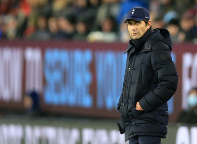 Tottenham Hotspur manager Antonio Conte shows a look of dejection.