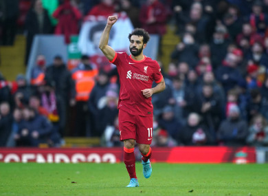 Mo Salah celebrates his 150th goal.