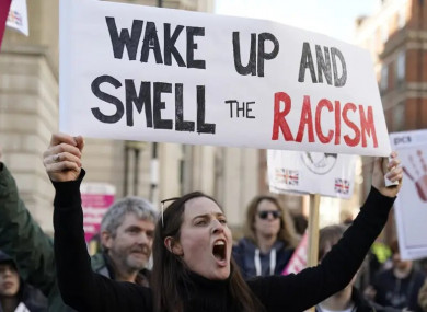 People take part in the march in central London.