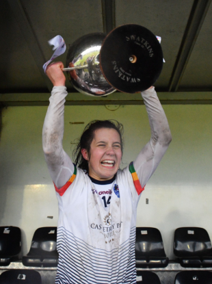 Fiadhna Tangney lifting the silverware.