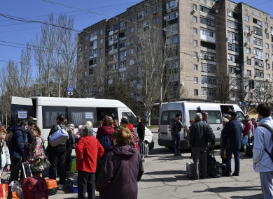 People waiting to board buses during their evacuation in Kramatorsk, Ukraine today.