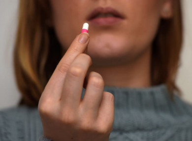 File photo of a woman holding a tablet