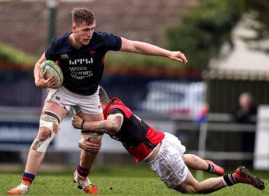 Clontarf’s Cormac Daly is tackled.