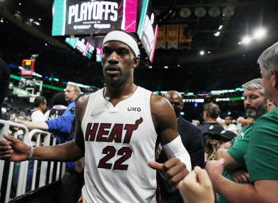 Miami Heat's Jimmy Butler leaves the court after his team's win.