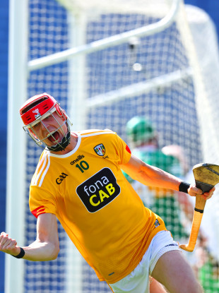 Antrim's James McNaughton celebrates scoring a goal.