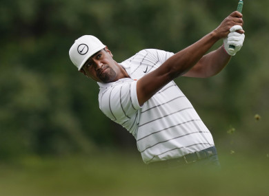 Tony Finau drives from the first tee in Detroit.