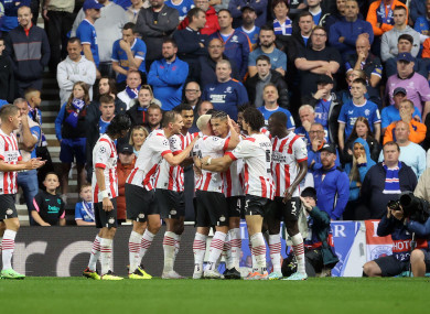 PSV Eindhoven's Armando Obispo celebrates scoring.