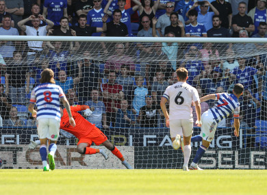 Reading's Shane Long scores his side's first goal of the game.