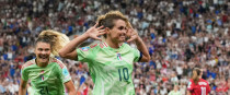Italy's Cristiana Girelli, centre, celebrates after scoring her side's second goal.