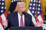 Trump speaks at an event for the signing of the GENIUS Act, a bill that regulates stablecoins, a type of cryptocurrency, in the East Room of the White House yesterday.
