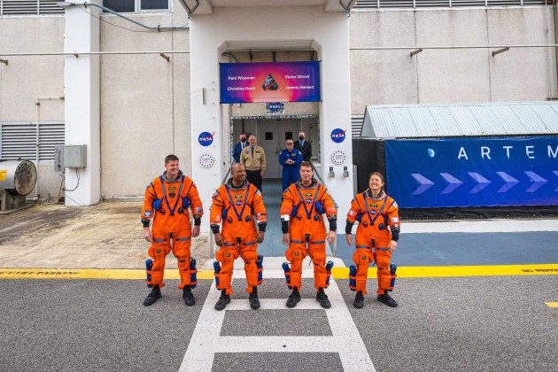 Astronauts strapped in for historic lunar launch but NASA faces last minute battery issue