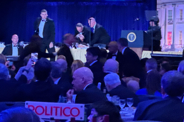 Trump rushed from White House Correspondents' Dinner after gunman fires shots